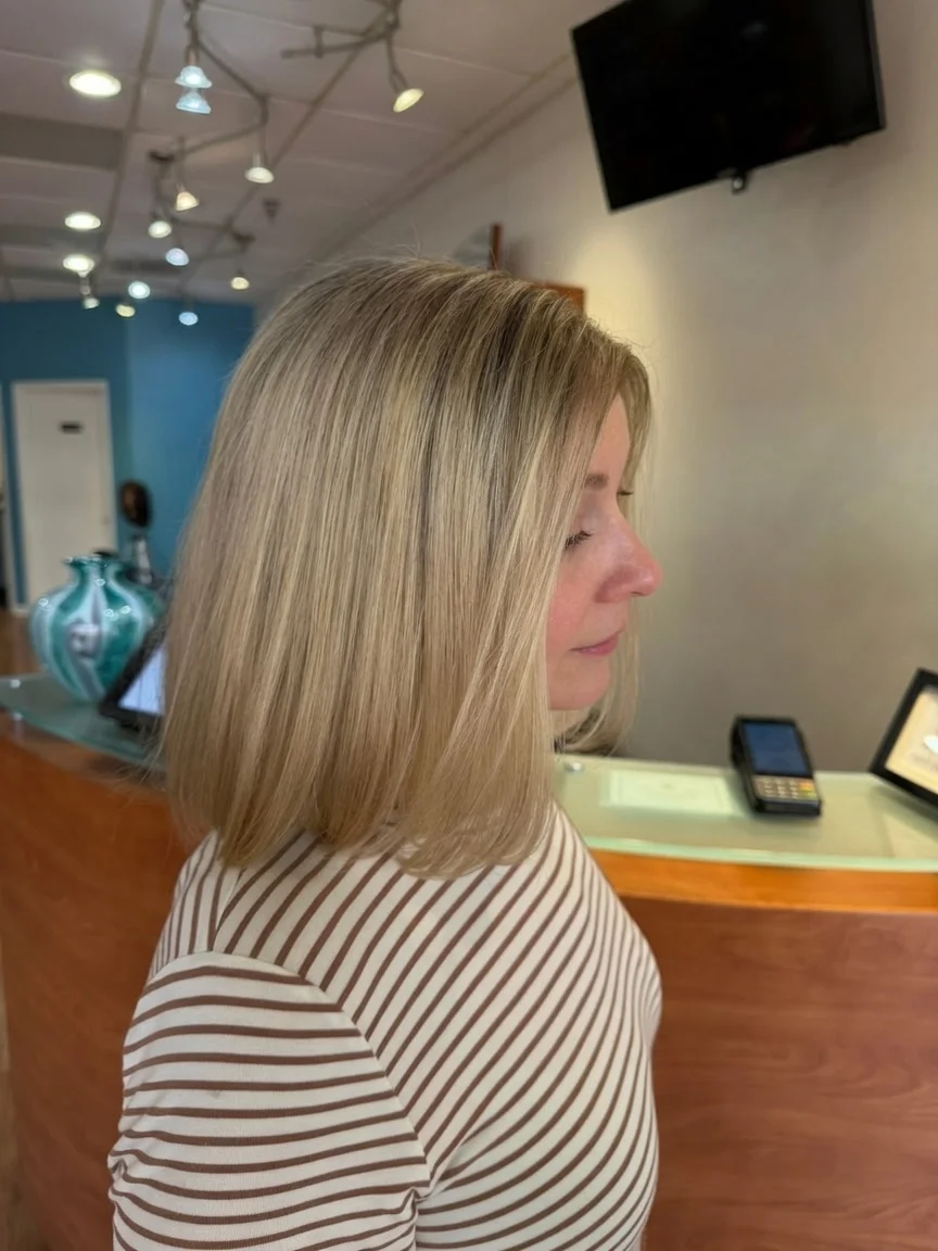Cool blonde lob with soft dimension, sleek finish