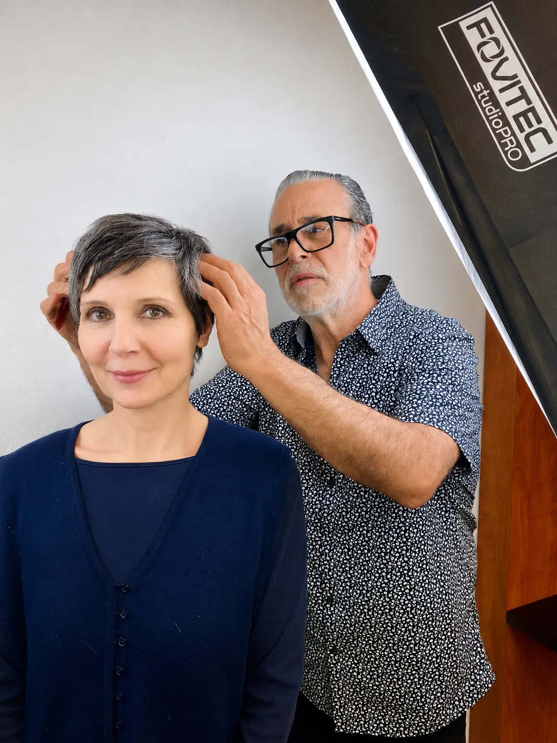 A silver pixie cut being shaped by Michele Anzivino at Ciao Bella Salon